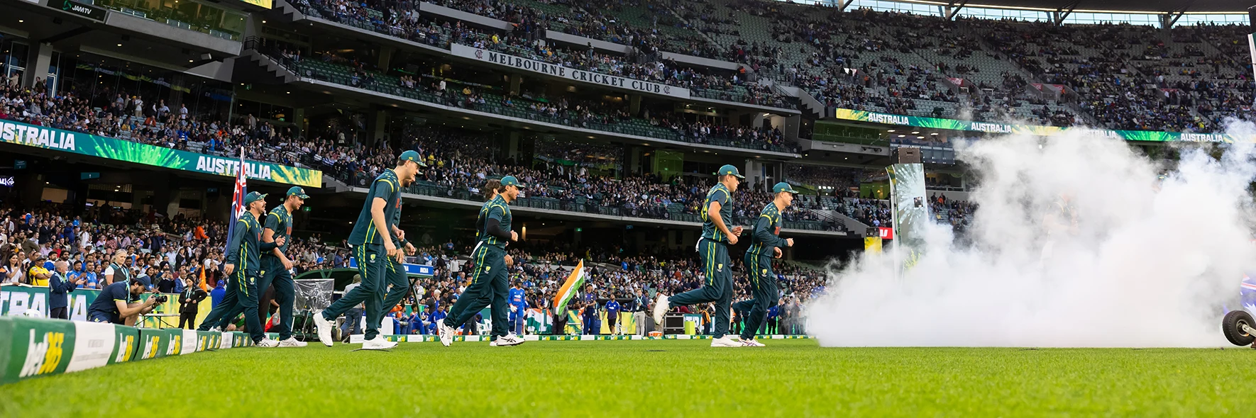 Australia men's cricket side enter arena in front of Melbourne Cricket Club