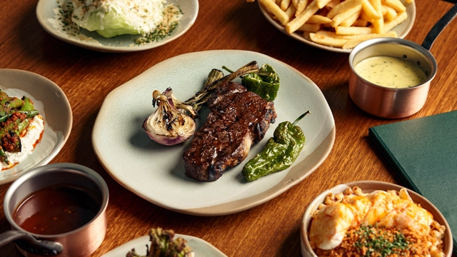 A spread of food on the table at the Jim Stynes Grill located at the MCG