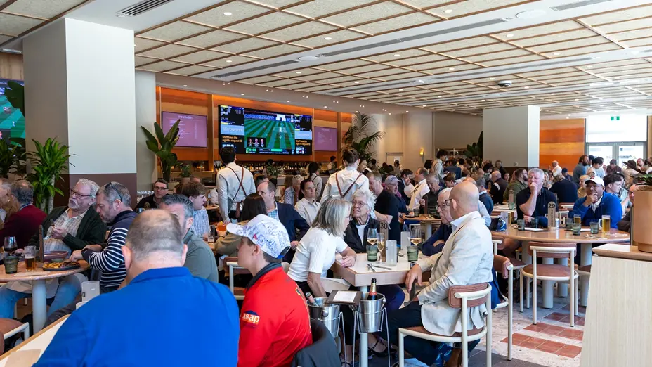 Patrons dining and drinking in The Pavilion bar and restaurant during a match