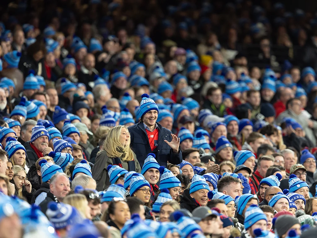 A packed MCG crowd wearing Big Freeze beanies during the annual match.