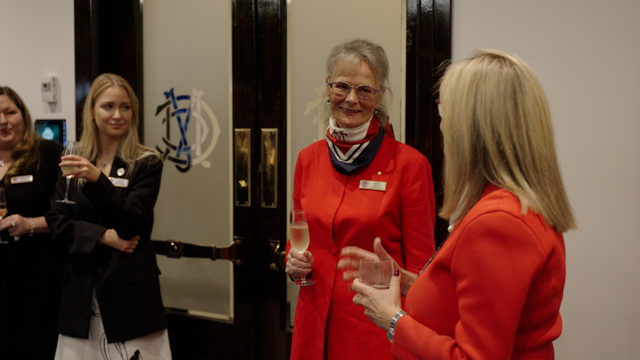 Jane Nathan AM speaks with other members of the Women of the MCC
