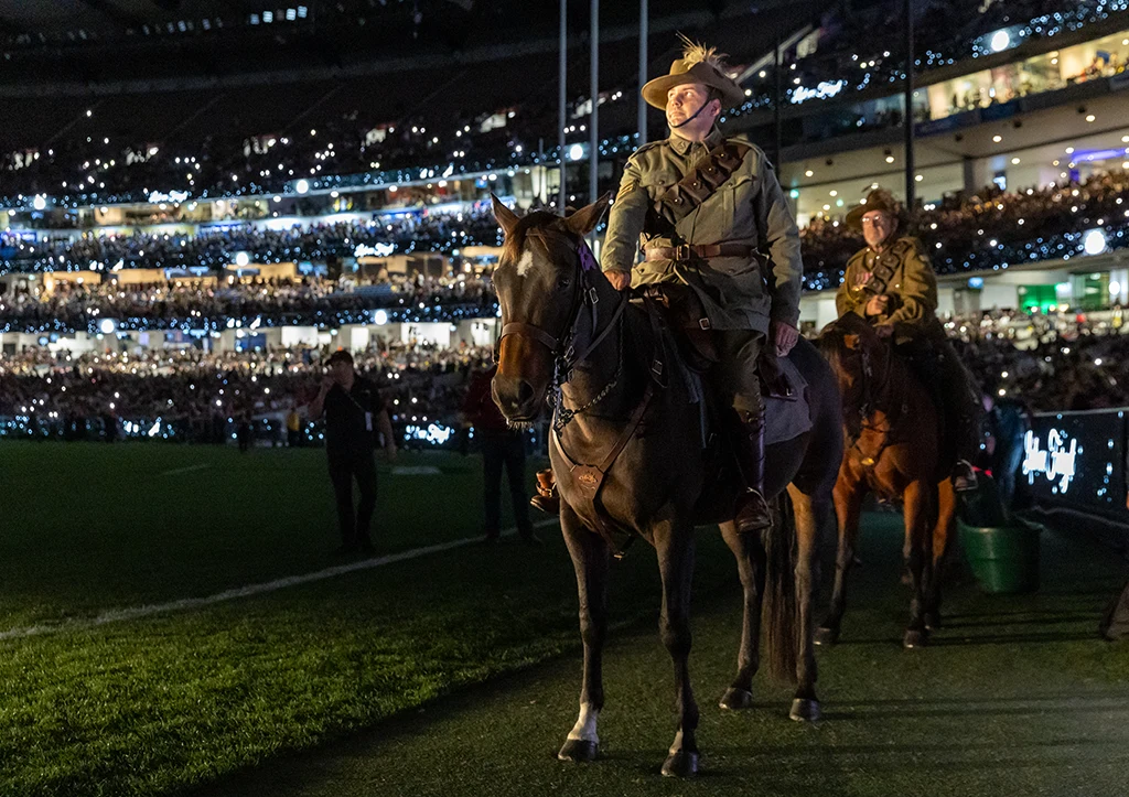 Military personnel during ANZAC Day Eve proceedings at the MCG