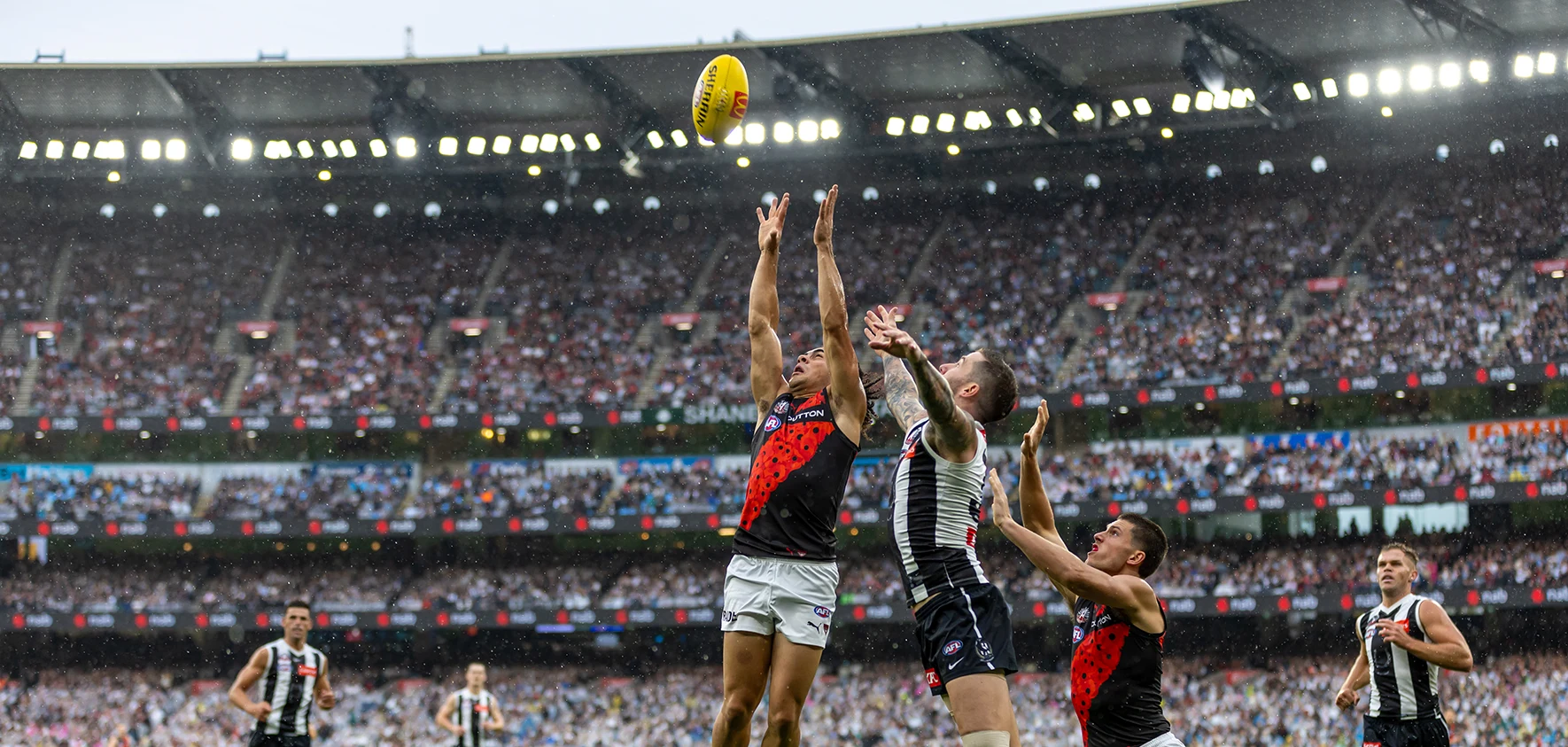 Collingwood and Essendon ANZAC Day match in the rain