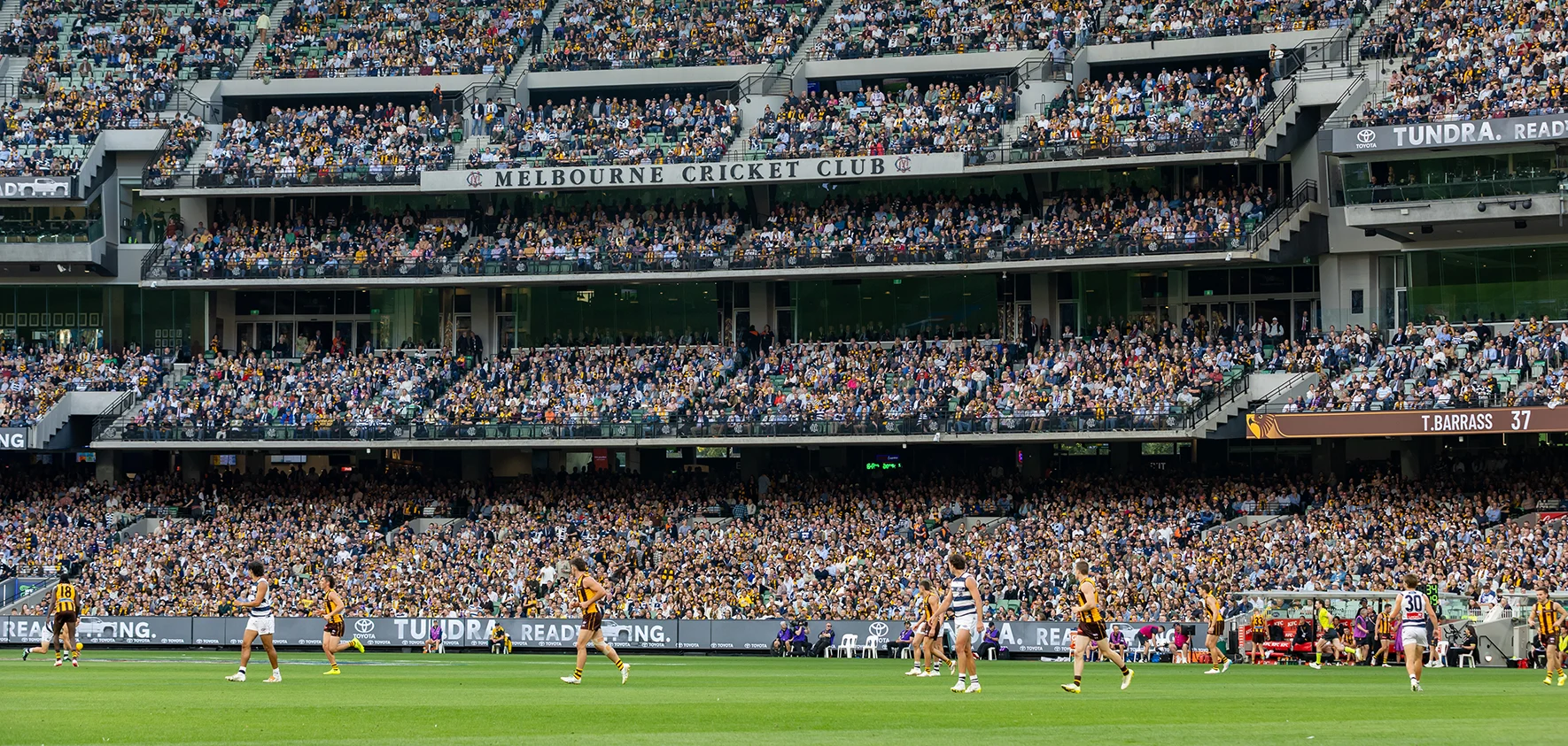 Hawthorn AFL match in play against backdrop of Members' Stand