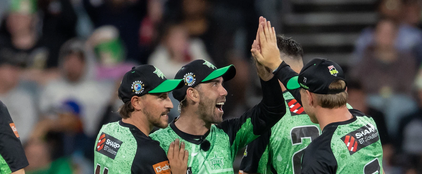 Melbourne Stars players high-five and celebrate