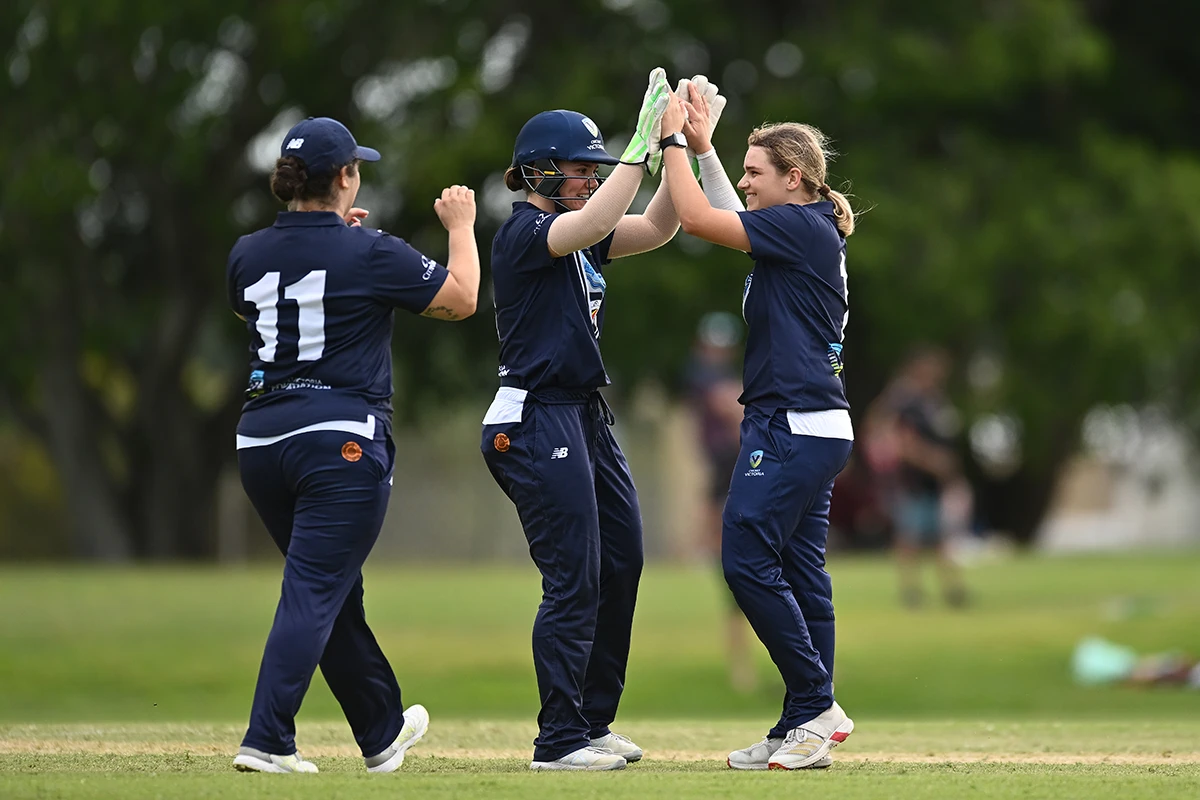 Victoria women's cricket team celebrate a wicket during the National Indigenous Cricket Championships