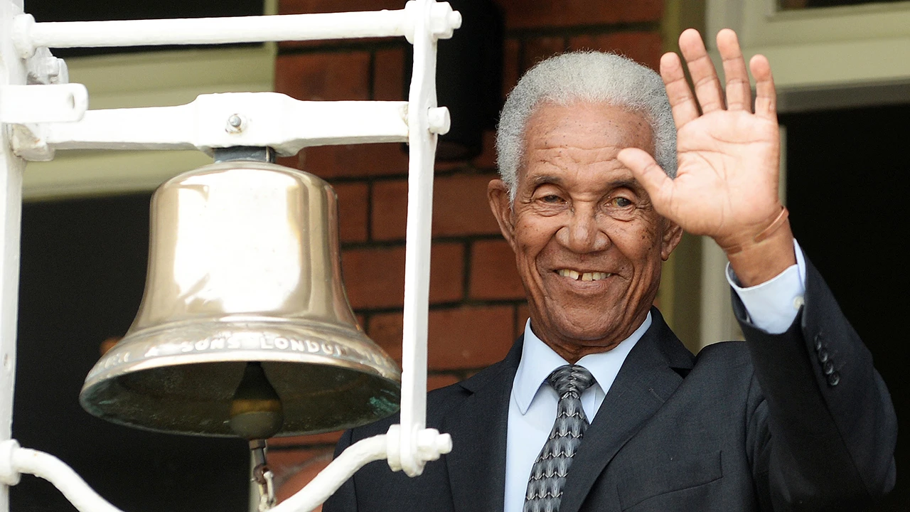 Sir Garfield Sobers rings the five-minute bell at Lord's Cricket ground