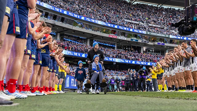 Guard of honour for Neale Daniher at AFL Big Freeze match
