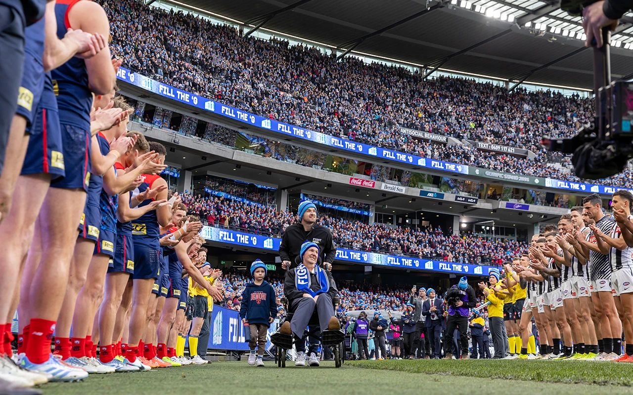 Guard of honour for Neale Daniher at AFL Big Freeze match