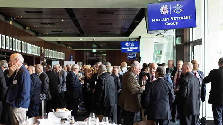 Members mingle at a formal function in the Members' Reserve