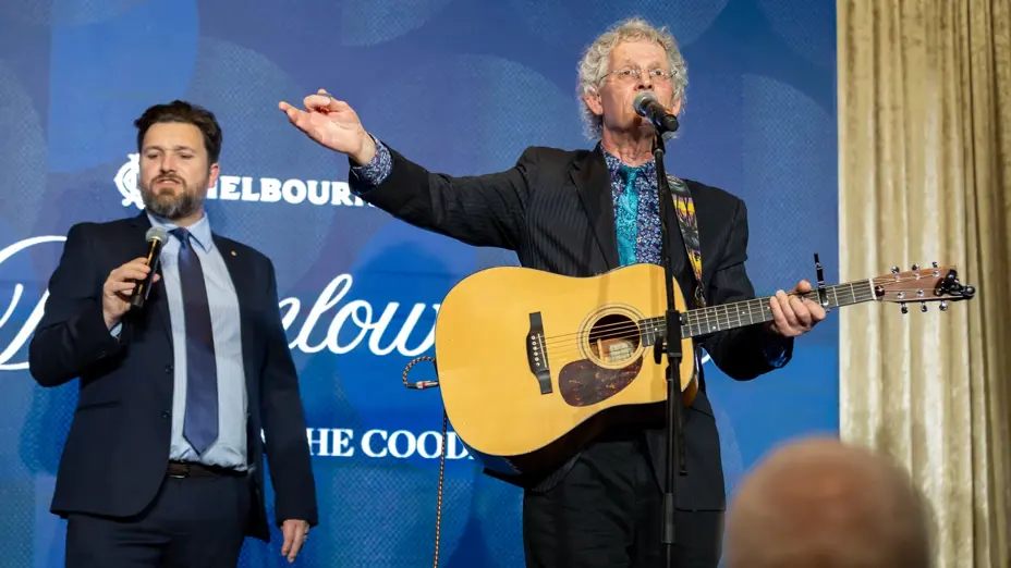 The Coodabeens guitarist gestures to the audience