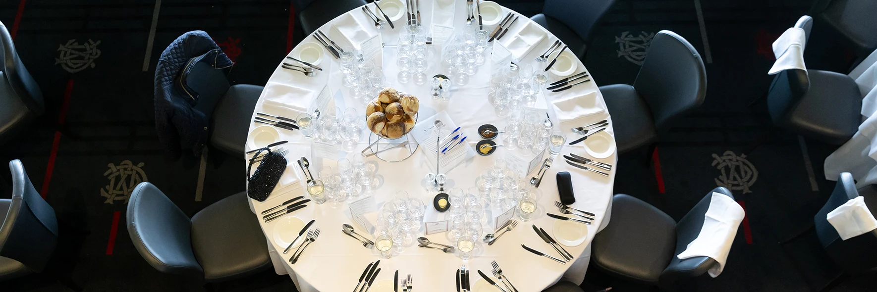 Formal dining arrangement set for 10 guests