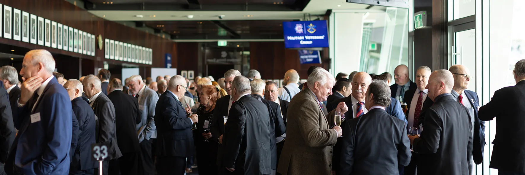 Members mingle at a formal function in the Members' Reserve